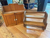 Cupboard and toweling rack side by side