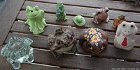 All nine figurines arranged on tabletop