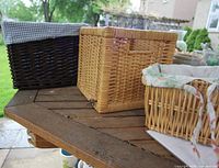 Overview of three wicker baskets on table