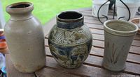 Front view of all three vases upright