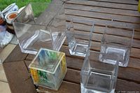 All five glass square planters on table