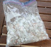 Full sealed bag of decorative glass gems