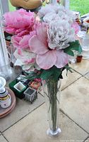 vase standing with faux flowers visible full length