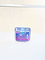 Front view of sealed DenTek Instant Pain Relief Applicators blister pack