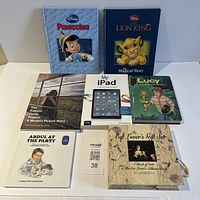 All seven books laid out showing covers