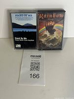 Front view of both cassette tapes in cases