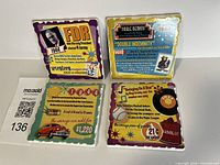 All four 1944 trivia stone coasters front view