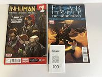 Front covers of both comic books showing titles and issue numbers