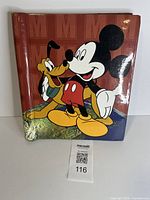 Front cover showing Mickey Mouse and Pluto illustration on red background