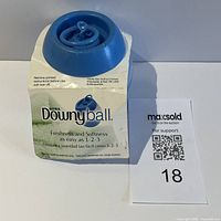 Front view of Downy Ball with instruction sleeve and lot identifier