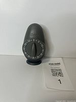 Front view of Ekco egg timer showing dial and logo
