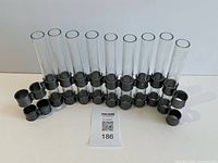 Full view of 12 glass tubes in grey holders