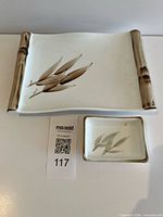 Large and small ceramic pieces with bamboo design