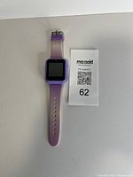 Front view of purple iTime kids smartwatch with display off