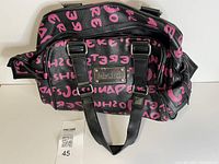 Full exterior view of Joshua Perets handbag showing colour, size, handles, side pockets