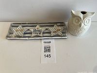 overview of owl figurine and star tray