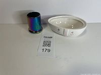 Full view of candle holder and ceramic dish
