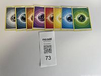 Eight basic energy cards laid out in a row