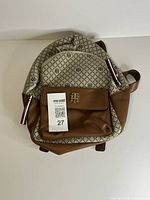 Full view of Tommy Hilfiger monogram backpack