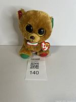Front view of TY Beanie Boos Bella bear plush with tag visible
