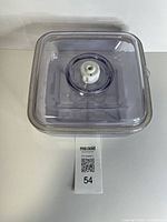 Top view of square vacuum container showing lid and valve