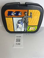 Front view showing R2-D2 and C-3PO design