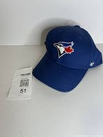 Front view of blue youth Toronto Blue Jays baseball cap