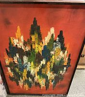 Full view of framed abstract cityscape oil painting