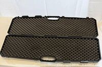 Case open showing eggcrate foam padding