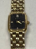 Close-up of Bulova watch face and bracelet