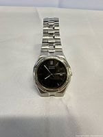 Front view of Citizen stainless steel watch on white background
