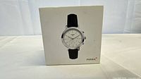 Retail box front with watch image