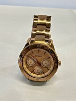 Front view of Fossil rose gold chronograph watch showing dial and bracelet