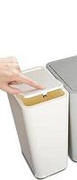 White rectangular trash can with hand pressing pop-up lid