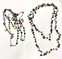 Both necklaces coiled for overview