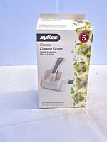 Front of retail box displaying Zyliss Classic Cheese Grater