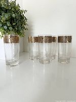 All five Culver Tyrol tumblers grouped on surface