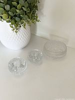 Iittala Ultima Thule bowl and two candle holders grouped