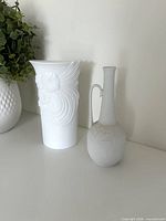 Both vases side by side showing overall size comparison and shapes
