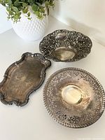 All three vintage metal dishes grouped
