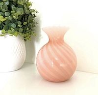Front view of pink swirl Murano glass vase