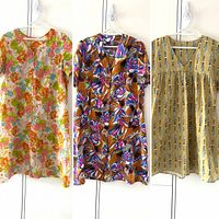 Composite shot of all three dresses hanging