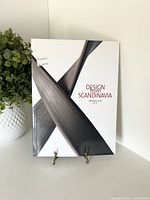 Front cover of book on stand