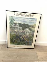 Front view of framed poster showing artwork and title text