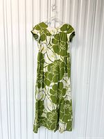 Front view of green and white floral maxi dress on hanger