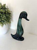 Front side view of ceramic duck figurine