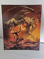 Front image of Boris Vallejo poster card showing fantasy battle artwork