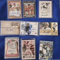 All nine autographed cards arranged in three-row grid