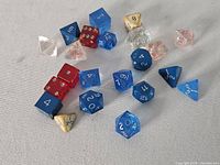 Group shot of all dice showing variety of colours and shapes