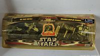 Front of sealed Titanium Series box showing all four die-cast vehicles and Star Wars branding